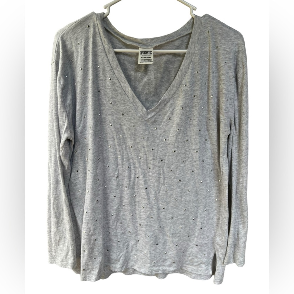 Victoria’s Secret light grey shirt with sequins on front. Size S